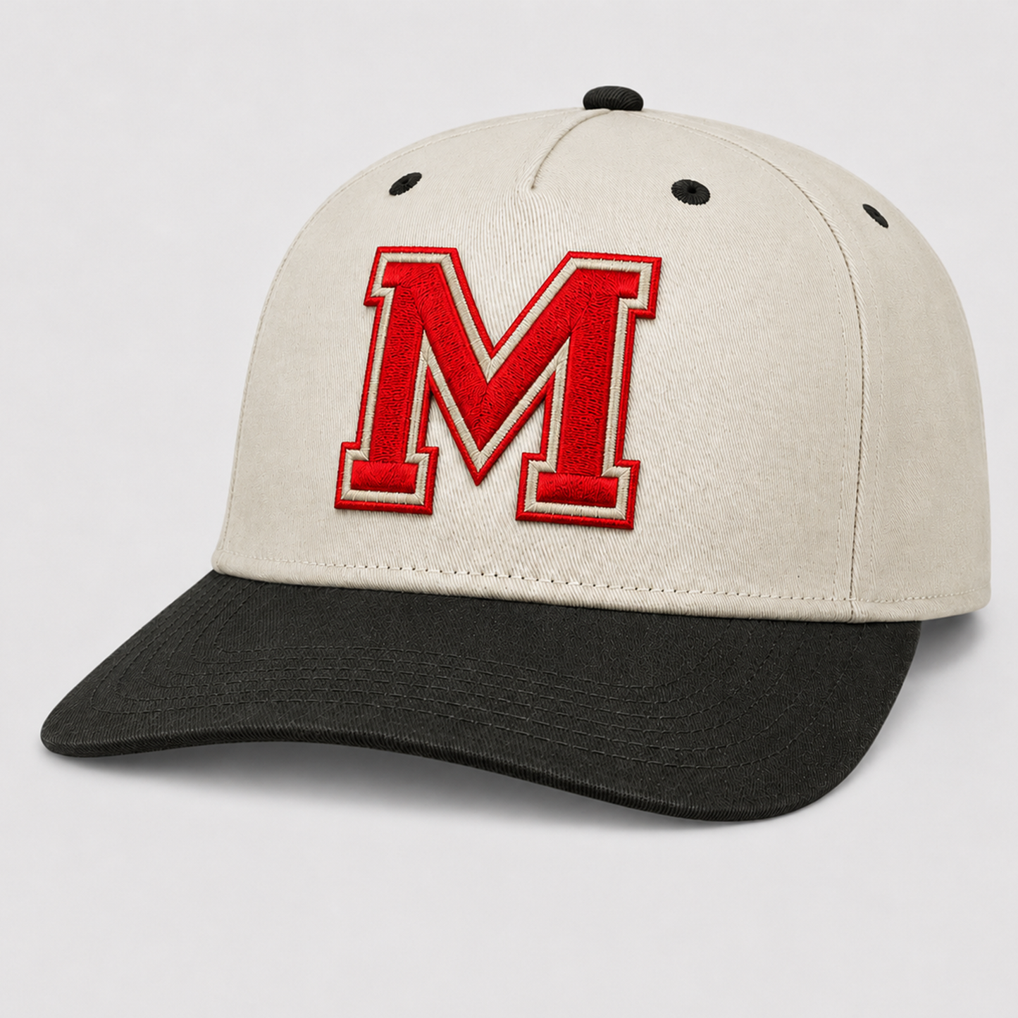 Massis M Hat with red block M on cream and black cap